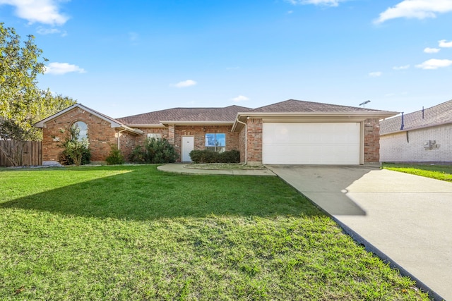 ranch-style house featuring a front lawn and a garage