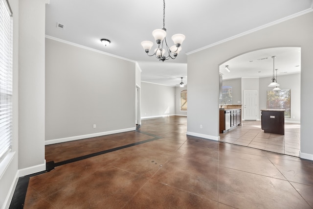 unfurnished dining area featuring crown molding, concrete floors, and ceiling fan with notable chandelier