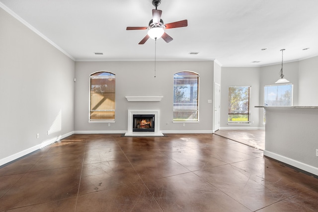 unfurnished living room with ceiling fan and ornamental molding