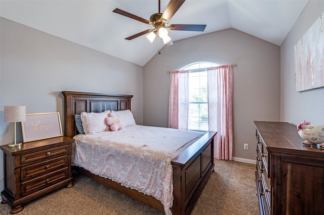 carpeted bedroom featuring ceiling fan and vaulted ceiling