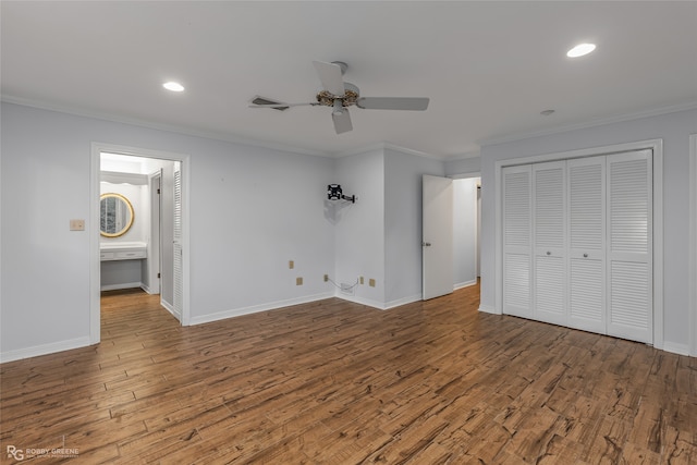 unfurnished bedroom featuring ceiling fan, hardwood / wood-style floors, and ornamental molding