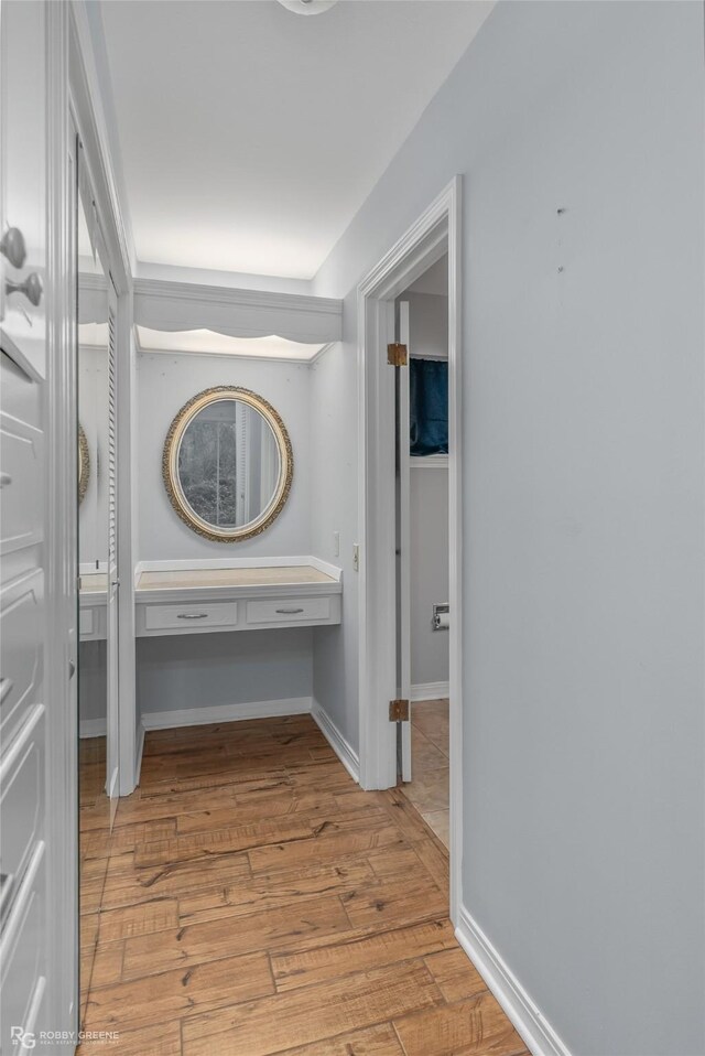 corridor featuring light hardwood / wood-style flooring