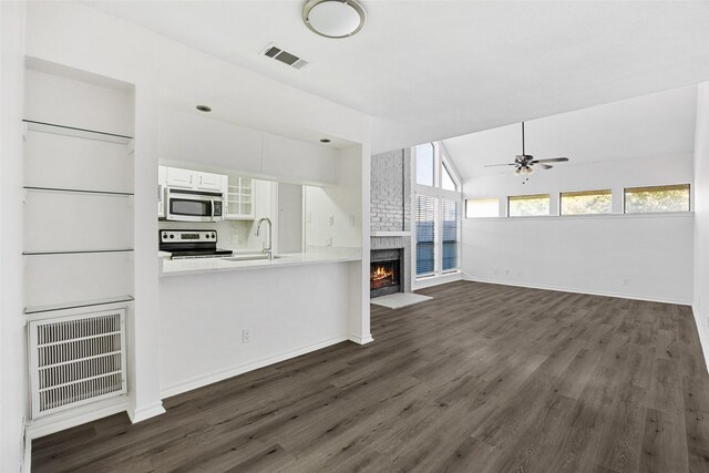 laundry room featuring hardwood / wood-style flooring, hookup for an electric dryer, and washer hookup