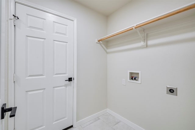 laundry room featuring electric dryer hookup, hookup for a washing machine, and light tile patterned flooring