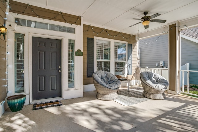 doorway to property with covered porch and ceiling fan