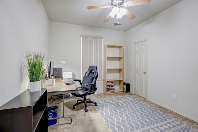 office with carpet and ceiling fan