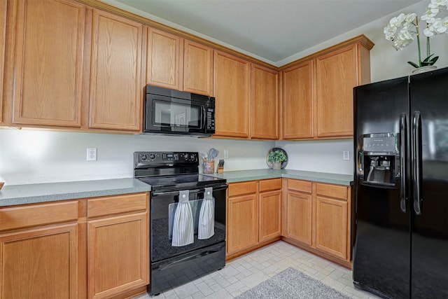 kitchen with black appliances