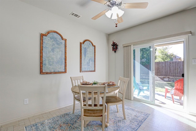 dining room with ceiling fan