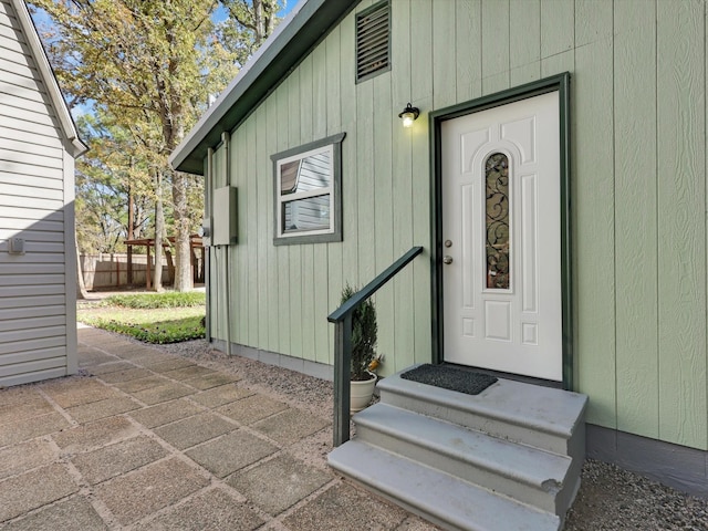 property entrance featuring fence