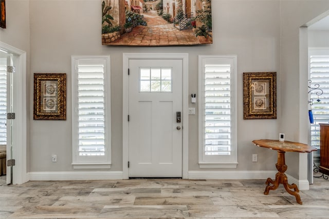 foyer with light hardwood / wood-style flooring