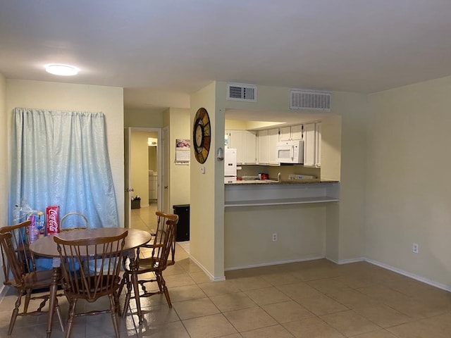 view of tiled dining area