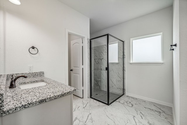 bathroom with vanity and walk in shower