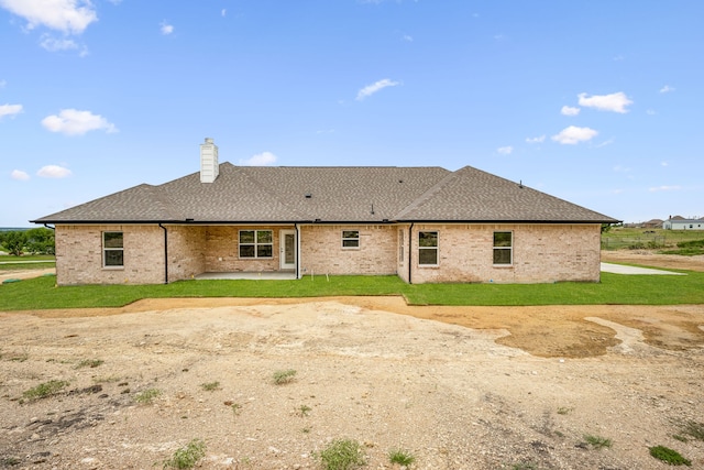 rear view of house with a patio area