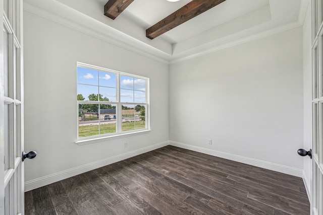 empty room featuring beamed ceiling, crown molding, and dark wood-type flooring