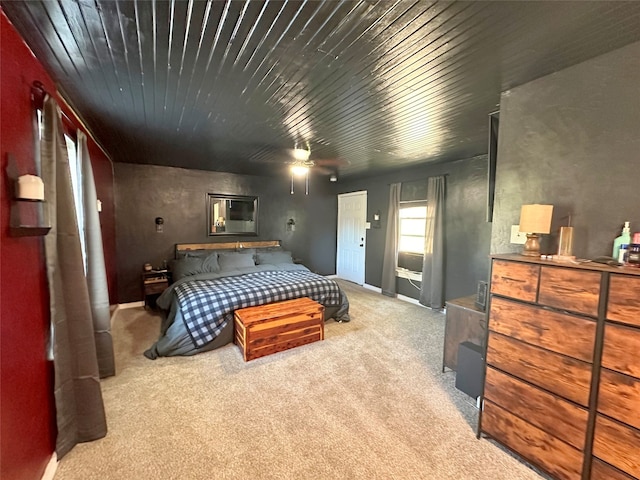 bedroom with ceiling fan and light colored carpet