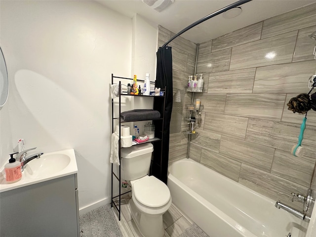 full bathroom featuring shower / tub combo, vanity, and toilet