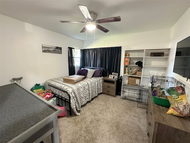 bedroom with light colored carpet and ceiling fan