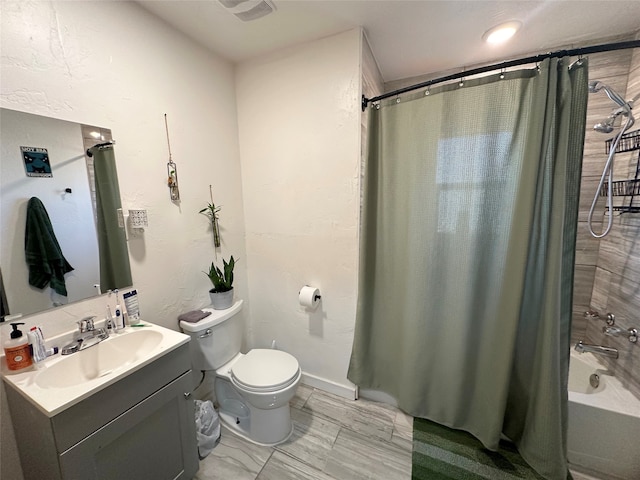 full bathroom with shower / bath combination with curtain, vanity, and toilet