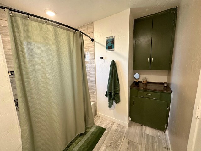 bathroom featuring hardwood / wood-style floors