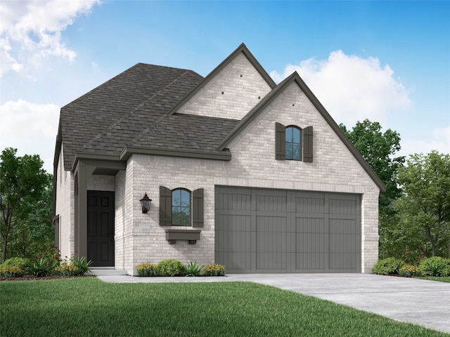 french provincial home with a front lawn and a garage