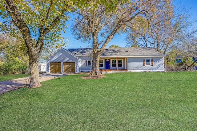 ranch-style home with a front lawn and a garage