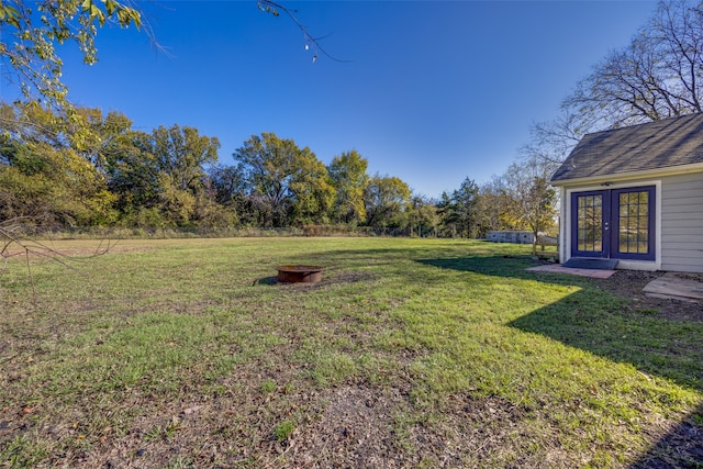 view of yard featuring french doors