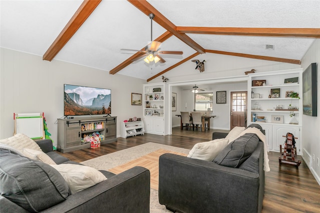 living room featuring ceiling fan, dark hardwood / wood-style flooring, lofted ceiling with beams, and a textured ceiling