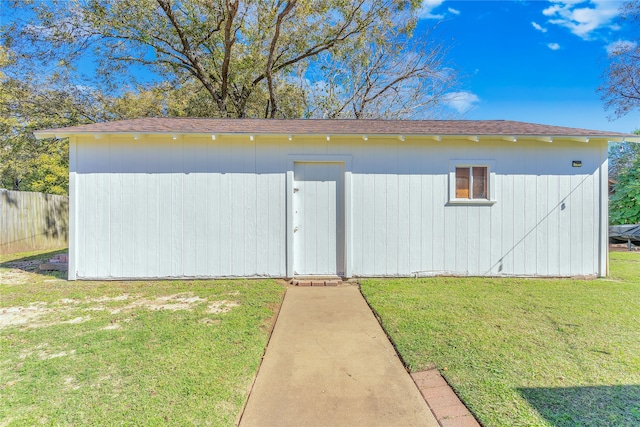 view of outdoor structure with a yard