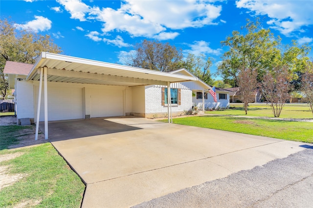 ranch-style house featuring a front lawn and a carport