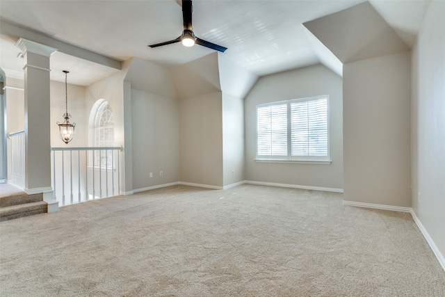 interior space featuring light carpet, ceiling fan, and lofted ceiling