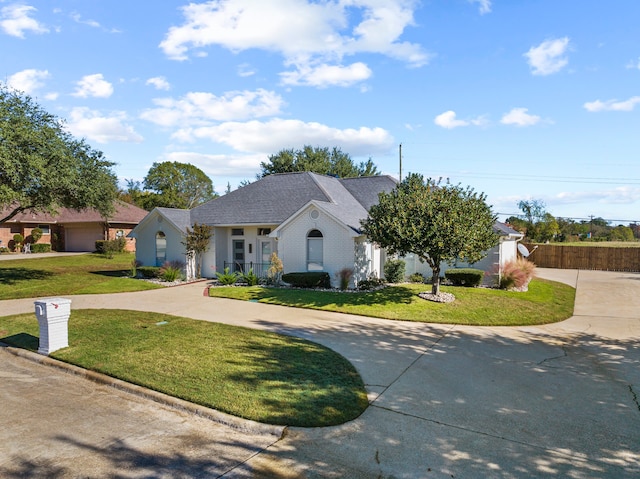 view of front of home with a front yard