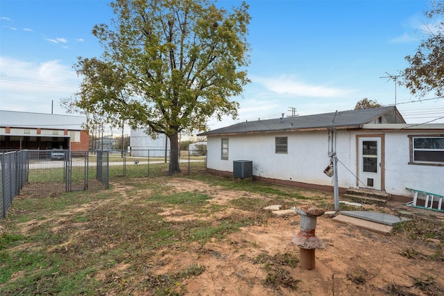 view of yard featuring central AC