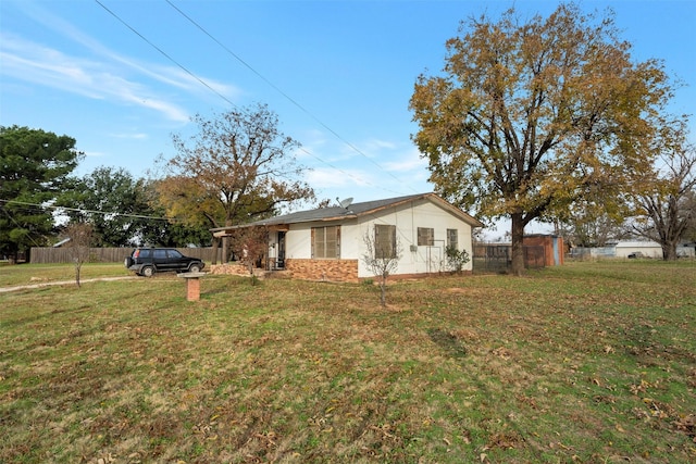 ranch-style house featuring a carport