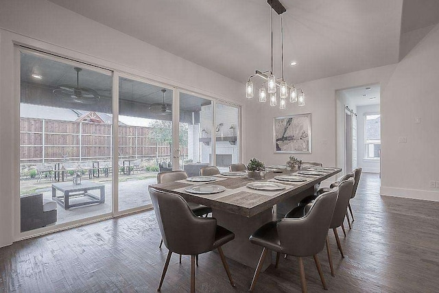 dining room featuring wood-type flooring and a wealth of natural light