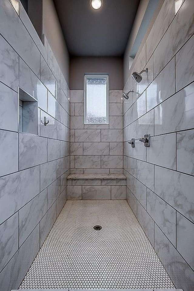 bathroom featuring tiled shower