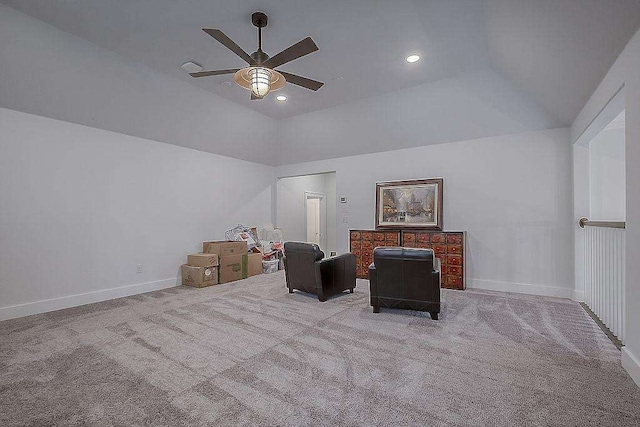 interior space with ceiling fan and vaulted ceiling