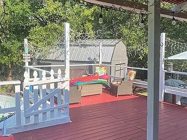 deck with an outdoor hangout area