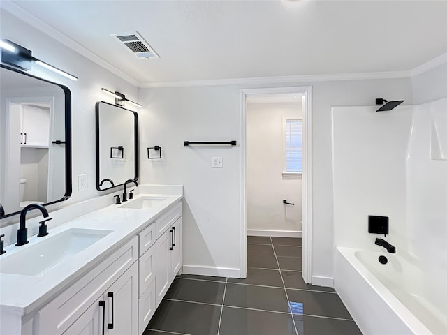 full bath with double vanity, a sink, visible vents, and crown molding