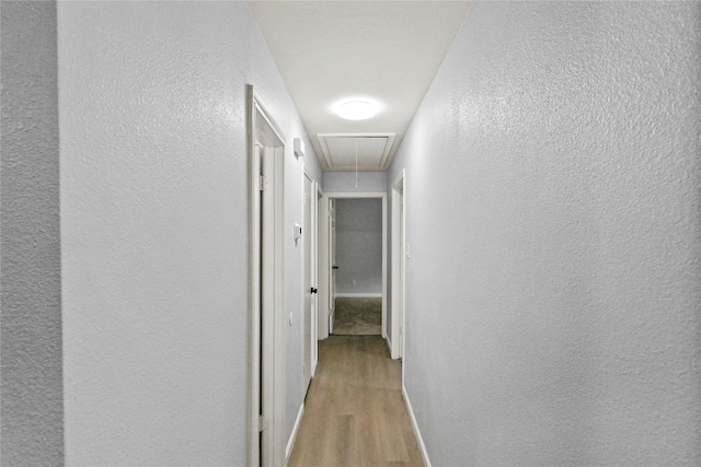 corridor featuring light wood-type flooring