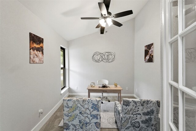 office area with ceiling fan, lofted ceiling, and carpet floors