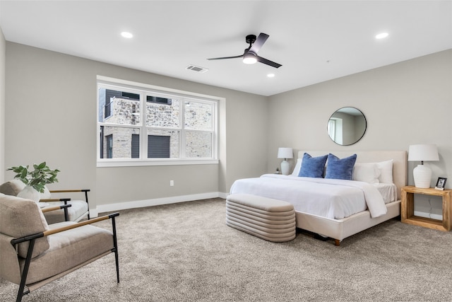 carpeted bedroom with ceiling fan