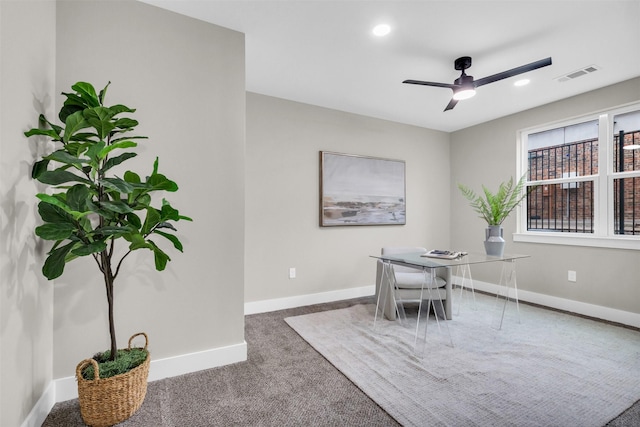 office area featuring carpet and ceiling fan