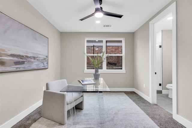 home office featuring carpet and ceiling fan