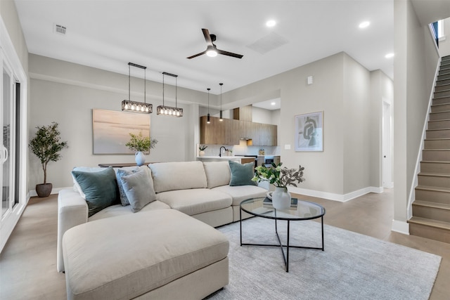 living room featuring ceiling fan