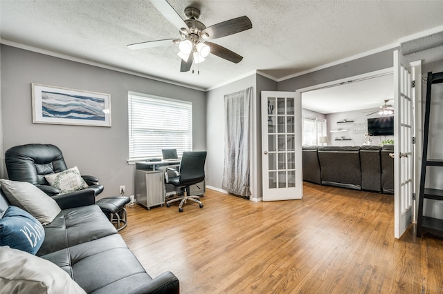 office area with crown molding, french doors, a textured ceiling, and hardwood / wood-style flooring