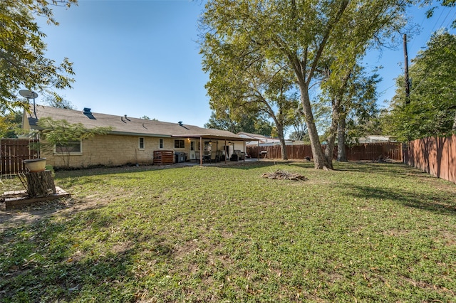 view of yard with a patio area