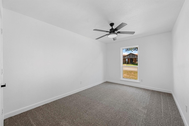 unfurnished room featuring carpet flooring and ceiling fan