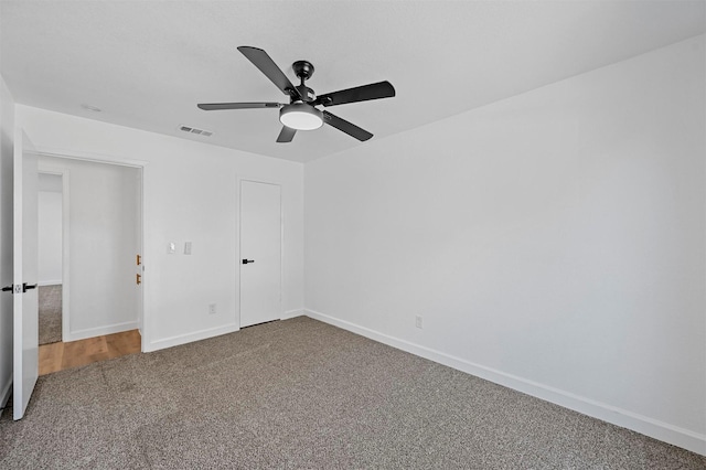 unfurnished bedroom with carpet flooring, a closet, and ceiling fan