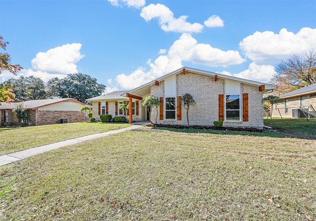 ranch-style house featuring a front lawn