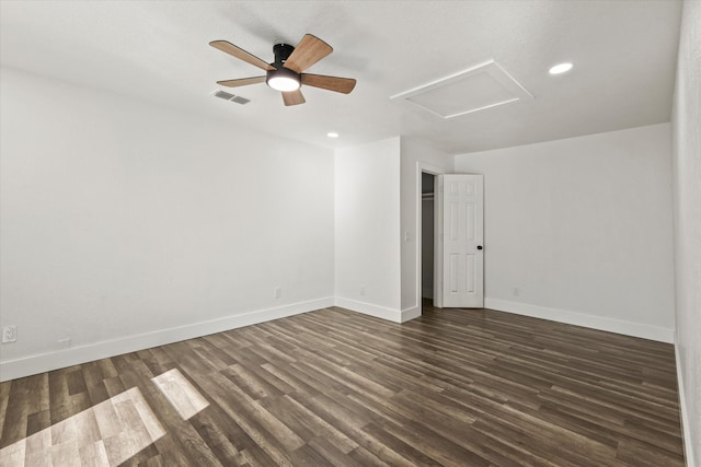 unfurnished room with dark hardwood / wood-style flooring and ceiling fan